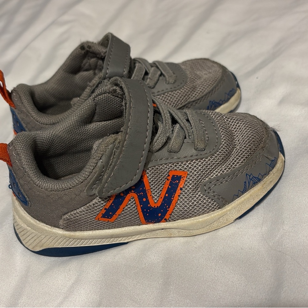 New Balance Gray and Orange Retro-Inspired Sneakers